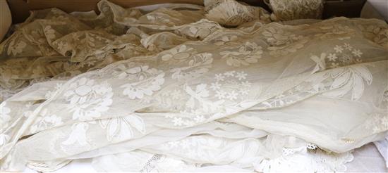 A 1920s lace wedding dress together with a collection of lace and white work and a lace bonnet